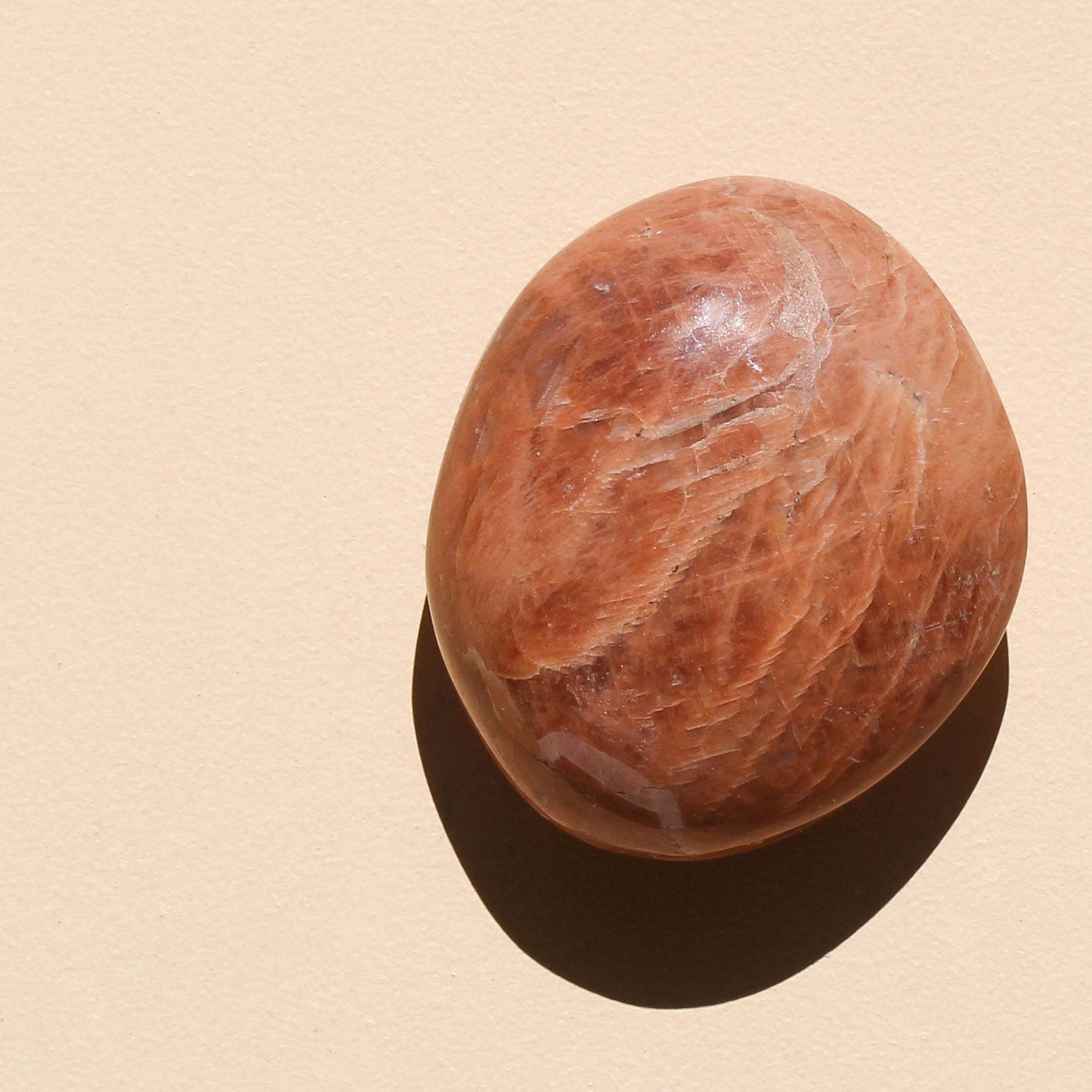 Peach Moonstone Palm Stone