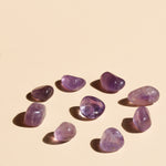 Amethyst Tumbles in circle with one in centre