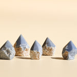 Five Angelite half-polished points in an alternating pattern