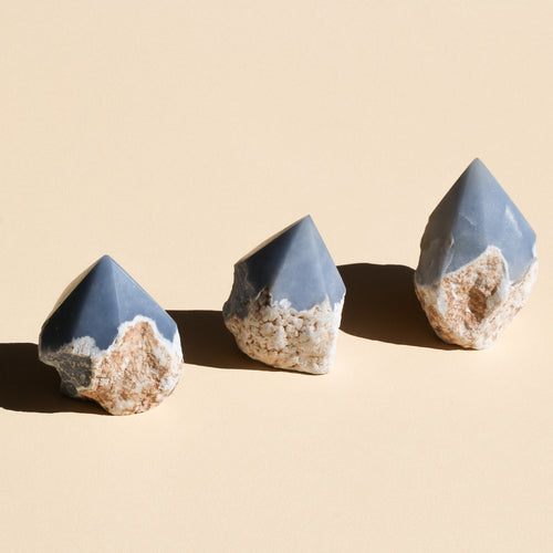 Three Angelite half-polished points in diagonal