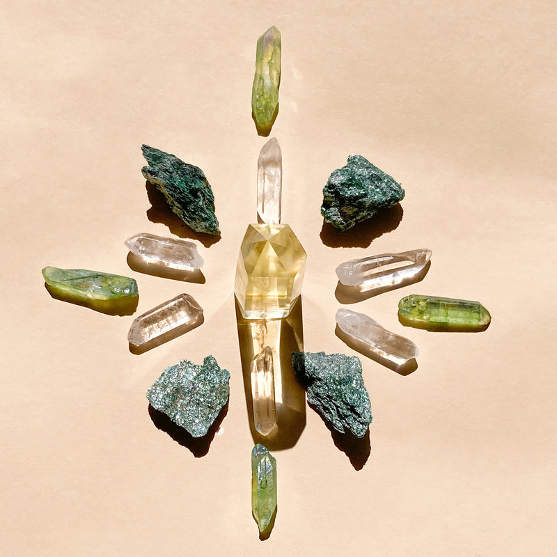 I Am Joyful & Abundant featuring a set of 1 medium Citrine Quartz Point (5-6cm), 6 polished Clear Quartz points, 4 Fuschite pieces (2-3cm), and 4 Aura Quartz necklace points, combining prosperity, clarity, and healing energies.