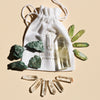 A set of 1 medium Citrine Quartz Point (5-6cm), 6 polished Clear Quartz points, 4 Fuschite pieces (2-3cm), and 4 Aura Quartz necklace points, combining prosperity, clarity, and healing energies, including a bag