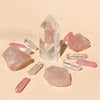 This bundle contains 1 medium Clear Quartz Point (5-6cm), 6 polished Clear Quartz points, 4 rough Rose Quartz chunks (2-4cm), and 4 Pink Aura Quartz necklace points, offering a harmonious blend of love and clarity